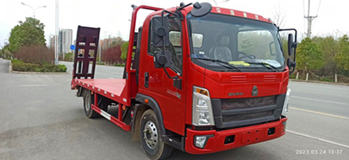 藍(lán)牌重汽豪沃60挖機平板車